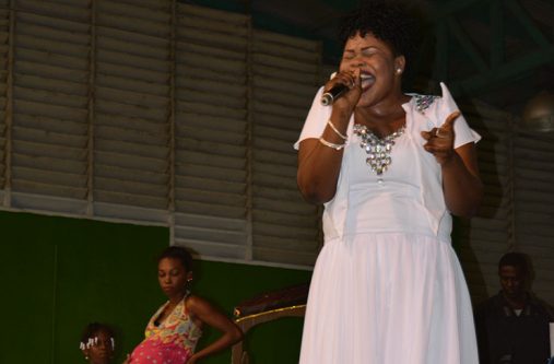 Tshanna Cort belting out
her winning song “Where
the Innocence Gone” at the
Cliff Anderson Sports Hall
Saturday night