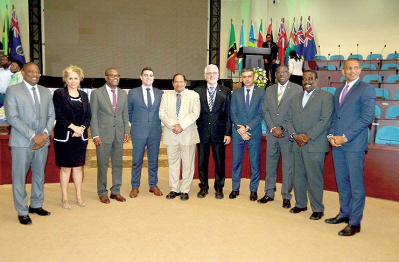 Prime Minister Moses Nagamootoo and Minister of Public Infrastructure, David Patterson join delegates and other officials at the IRF Congress for a group photograph (Adrian Narine photo)