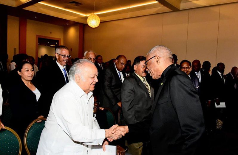 President David Granger greets former Commonwealth Secretary
General, Ambassador Sir Shridath Ramphal, during Monday’s
opening of the Heads of Mission Conference at the Pegasus Hotel