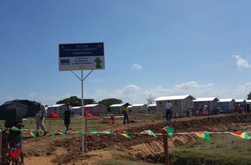 Residents and officials tour the New Hope Housing scheme at Onderneeming, West Coast Berbice