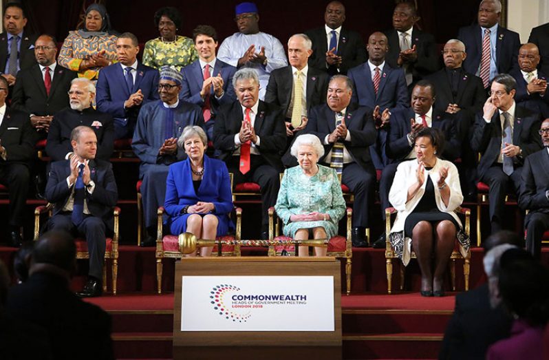 President David Granger (second right, third row) among world leaders at the 25th Commonwealth Heads of Government Meeting
(CHOGM) in London on Thursday. In front row are Queen Elizabeth II (second right) flanked by British Prime Minister Theresa May
(left) and Commonwealth Secretary General Patricia Scotland (right) (Commonwealth Secretariat photo)