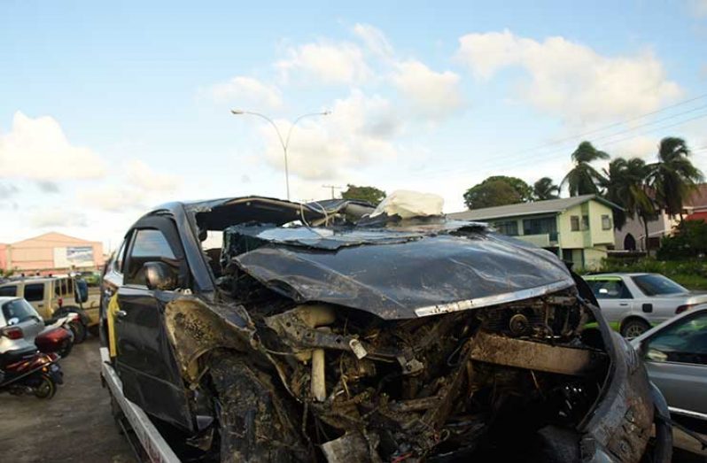 The mangled remains of the car following the accident