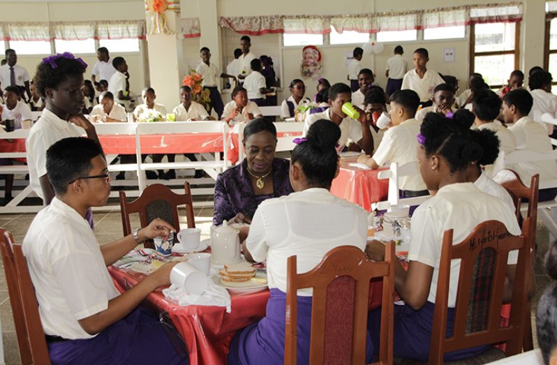 Education Minister, Dr Nicolette Henry enjoying breakfast
with students of President’s College