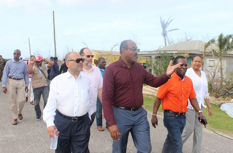 Antigua and Barbuda’s Prime Minister Mr. Gaston Browne leads the CARICOM Delegation on a tour of Barbuda’s devastated capital, Codrington. (Caricom Secretariat photo)