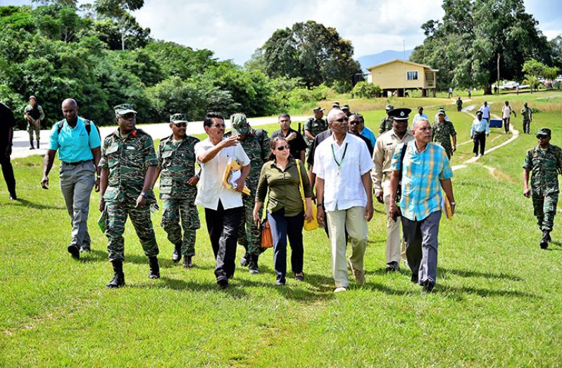 President David Granger and a delegation during a visit to the
border community of Kaikan, Region Seven on Wednesday
(Ministry of the Presidency photo)
