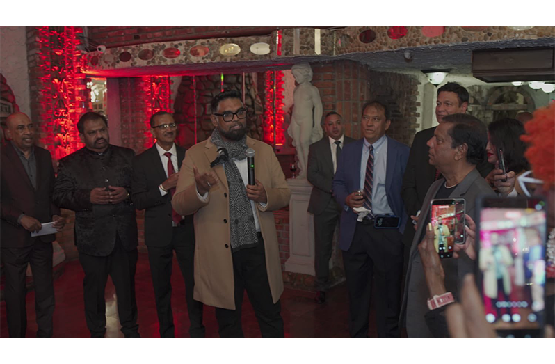 President Dr. Irfaan Ali on Saturday interacted with Guyanese at the International Centre for Democracy (ICD) get-together at the Villa Russo Banquet Hall
in Queens, New York, and later visited the Regent Street Lounge where he engaged patrons. He also stopped by the Ex-Guyana Defence Force Association
of New York to pay tribute to basketball coach Bernard Daniels, who he described as “a true pioneer who led with his heart, strength and wisdom”. In his
remarks, the President said it was a pleasure to recognise Coach Daniels’ lifelong dedication to the development of basketball, and his mentorship of
generations of young athletes. (Photos: President Dr. Irfaan Ali/Facebook)