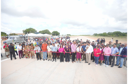 On Thursday, President Dr. Irfaan Ali commissioned the new 2,500-foot rigid concrete airstrip at Aishalton, Region Nine—another important step in connecting
our hinterland communities. Delivered in partnership with the Ministry of Public Works’ Special Projects Unit and the Village Council, the project created jobs
and skills training for more than 60 residents, and will significantly improve the movement of people, goods, and services. Plans are already in place for the
construction of a modern terminal. The airstrip will improve access to healthcare, lower the cost of living, expand market opportunities, and unlock new avenues
for economic growth. Government plans to construct at least 35 additional hinterland airstrips (Photos: President Irfaan Ali/Facebook)