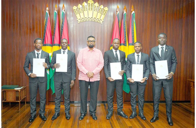 front2 President Dr Irfaan Ali presided over the swearing-in ceremony of five newly qualified land surveyors, urging them to uphold the highest ethical standards as they take on the critical responsibility of shaping Guyana’s future. Meshacq Richards, Kishon Dos Santos, Justin Jarvis, Troy Histick, and Tyrek Grant were officially sworn in after successfully completing the Land Surveyors examinations. The sixth successful candidate, Tyrese Spiers, is currently overseas and will be sworn in upon his return. The President noted that land surveying is far more than a technical vocation; it is a foundational pillar of national development (Photo President Ali/Facebook)