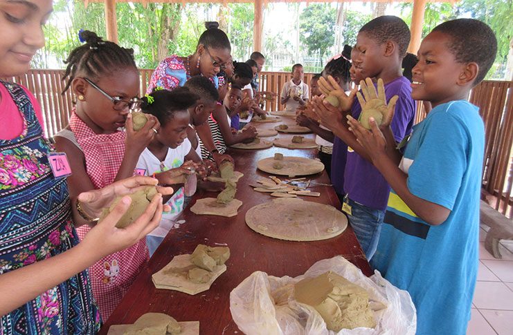 Children engaged in making
pottery at the Walter Roth
Museum of Anthropology