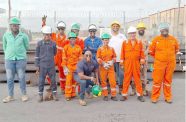 GAIMMS CEO Derek Cardinez (centre) and team with workshop apprentices at its Houston Commercial Complex Office