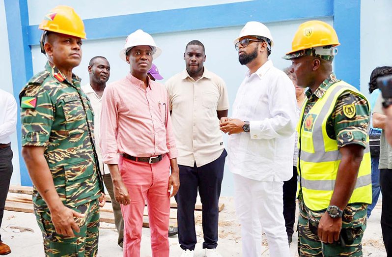 During a recent visit to Carriacou Chief of Defence Staff, Brigadier Omar Khan, President Dr. Irfaan Ali and Grenada’s Prime Minister, Dickon Mitchell engaged the ranks who were deployed to assist with rebuilding efforts (The office of the Prime Minister of Grenada)