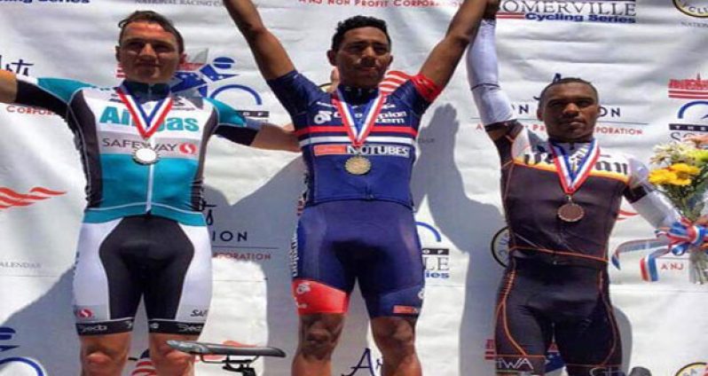 Geron Williams (centre) shows off his winning medal after winning the first race of the Raritan Cycling Classic Tour of Summerville Three-Race Series in New Jersey, USA on Saturday.