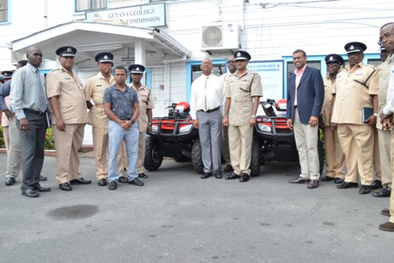 Minister of Natural Resources and the Environment, Robert Persaud, Police Commissioner (ag), Seelall Persaud and Guyana Geology and Mines Commission (GGMC) Commissioner, Rickford Vieira among ranks of the Guyana Police Force during the handing over ceremony at the GGMC compound