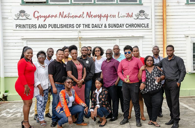 Employees of GNNL posing for a celebratory picture at the award ceremony held last Friday