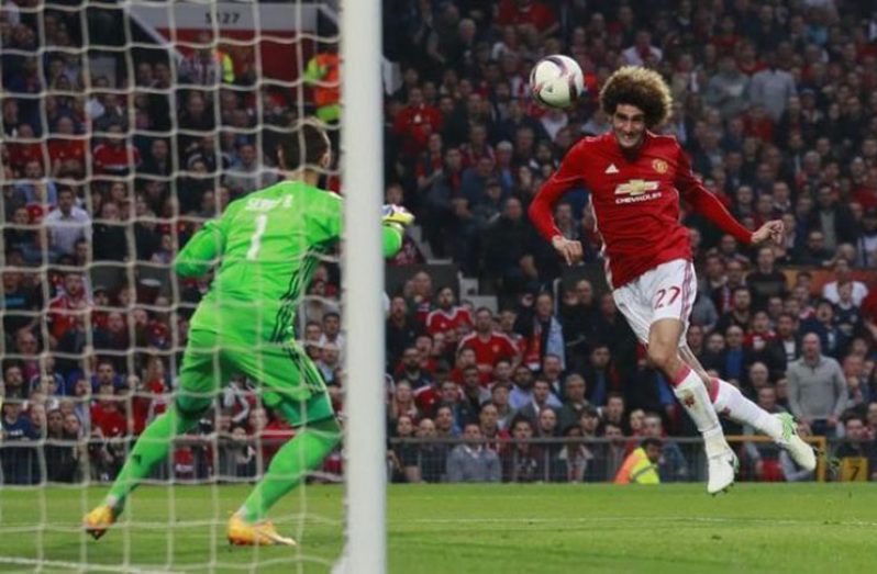 Manchester United's Marouane Fellaini scores their first goal. (Action Images via Reuters/Jason Cairnduff Livepic)