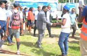 President, Dr. Irfaan Ali meeting with residents in Tucville during a walkabout in the community (Delano Williams photo)