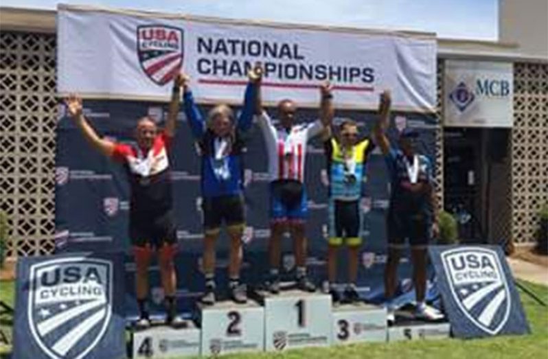 Guyana’s Olympian Aubrey Gordon stands at the top of the podium after winning the gold medal at the 2017 USA Masters Road National Criterium on Sunday.