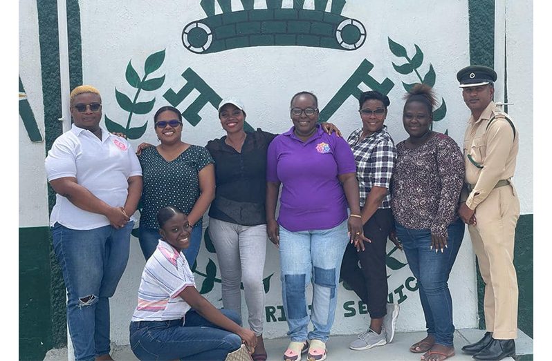 (From Right) Lusignan Prisons Officer-in- Charge, Senior Superintendent Deoraj Gyandat, with the final-year social work diploma students