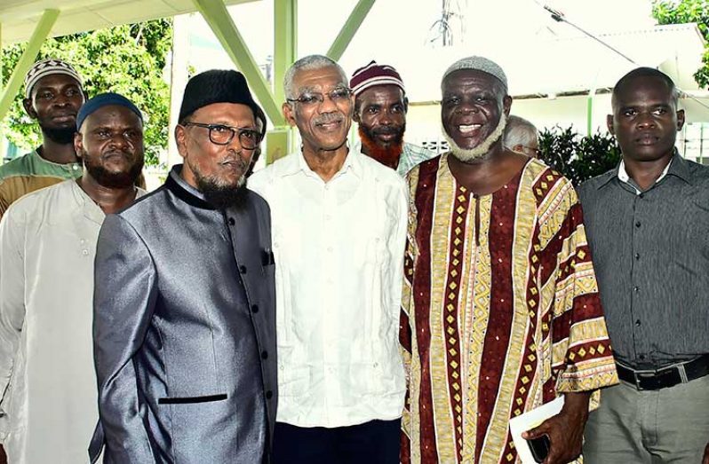 President David Granger with members of the Muslim community at the post Eid-ul-Fitr luncheon at State House 