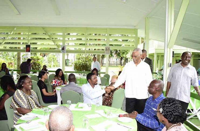 President David Granger greets a GPSU member(MoTP photo)