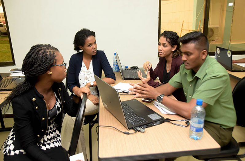 One of the groups formed to start a six-month post-workshop activity, studying the impacts of specific tools on area-specific disaster preparedness (Ministry of the Presidency photo)