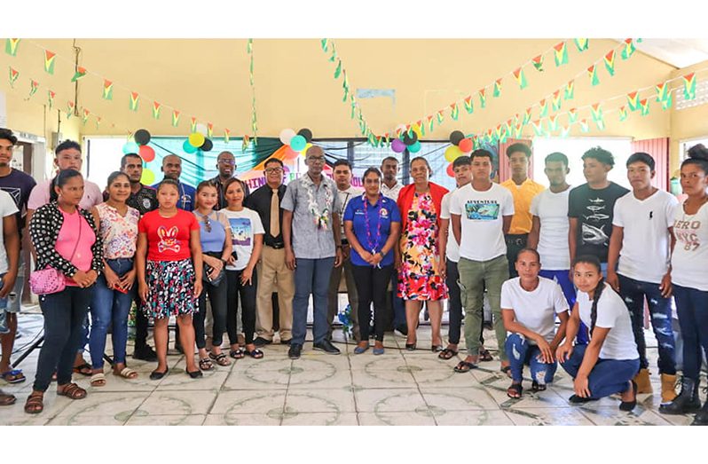 Minister of Labour, Jospeh Hamilton, flanked by trainees and officials at Tuesday’s launch