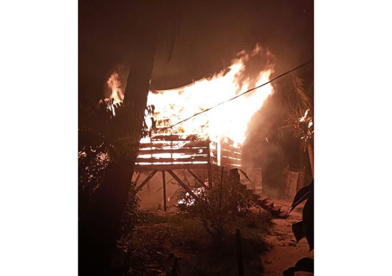 The house on fire.
