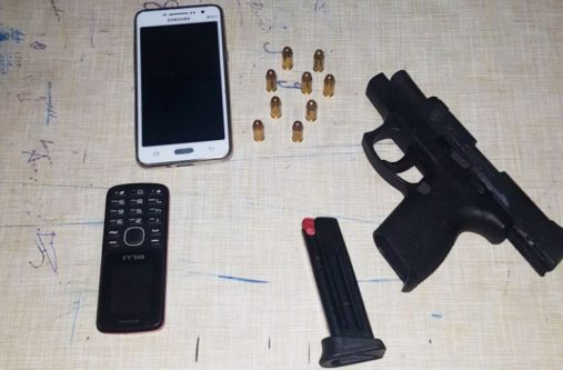 The loaded gun and matching ammunition and other paraphernalia the youngster was carrying when he was nabbed