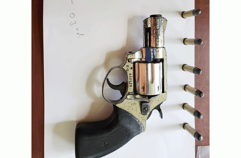 The firearm and matching ammunition which were found in a female washroom at CJIA (GPF photo)