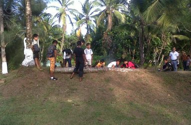 Children of Moruca firing bamboo guns