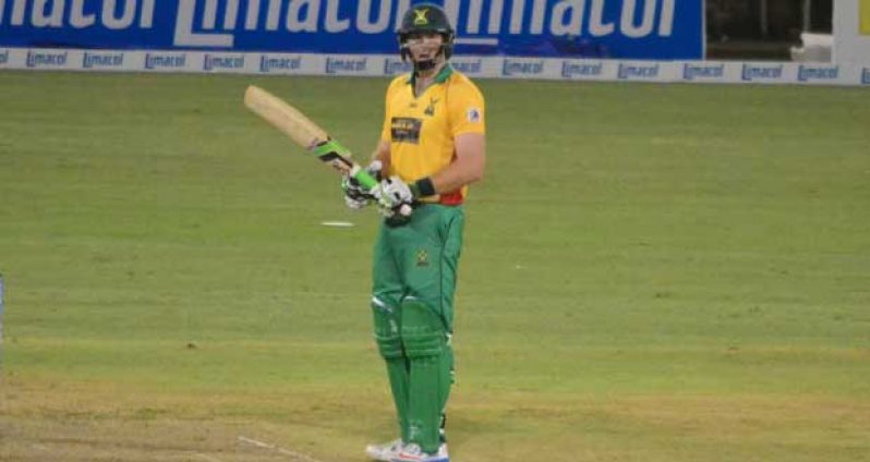 Well played Martin! Guyana Amazon Warriors opener Martin Guptil about to salute the crowd after reaching his 50 (Adrian Narine photos)