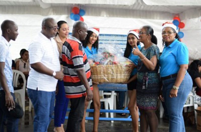 Jeffrey Harry, one of the lucky customers who won a grocery hamper