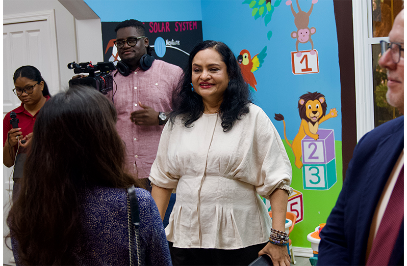 Dr. Vindhya Persaud leads the tour of the new childcare facility