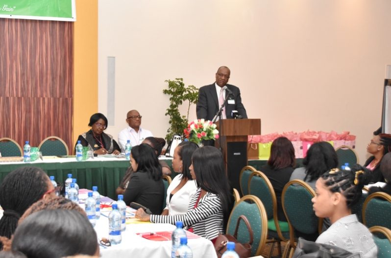 Minister of State , Joseph Harmon during his address at the event.