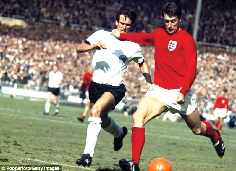 Sir Geoff Hurst scores a hat-trick in the 1966 FIFA World Cup Final.