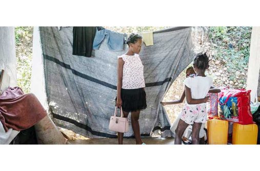 A family displaced by violence lives in a partially constructed school in Port-au-Prince, Haiti (UNOCHA/Giles Clarke photo)