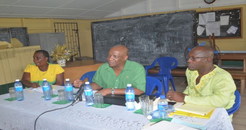 Minister of State and People's National Congress Reform (PNCR) Executive Joseph Harmon addresses the regional conference at Vreed en Hoop in the presence of party officials (Cullen Bess Nelson Photo)