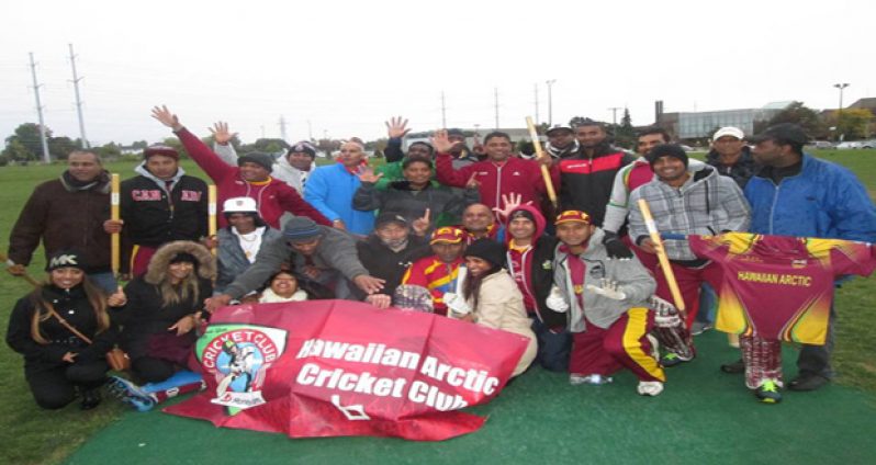 HACC players and supporters pose after the team’s sixth consecutive SCA Premiere League victory.