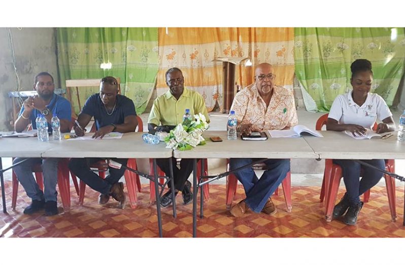 Head Table: (left to right) Mr. Richard Noble - Engineer, Mr. Dwayne Shako - Operations Director, Mr. Godfrey Washington-Abraham- Administrator, Washington Scheme, Dr. Richard Van-West Charles - Managing Director & Ms. Denise Woolford - Region Three