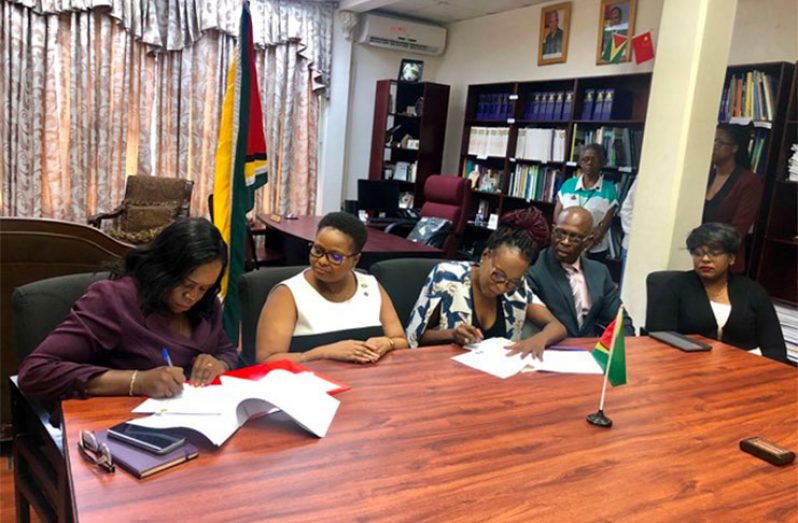 (From left)  Collette Adams, Permanent Secretary, Ministry of Public Health; Hon. Volda Lawrence, Minister of Public Health; Avia Lindie, Representative of Alpha & Omega Community Developers Inc; Dr. Morris Edwards, Director of the Health Sector Development Unit (HSDU) Ministry of Public Health and Maria Niles, Coordinator, Guyana Global Fund Country Coordinating Mechanism