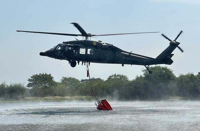 A helicopter bucket, or helibucket, is a special bucket attached to a cable, and carried by helicopter to drop water during firefighting operations