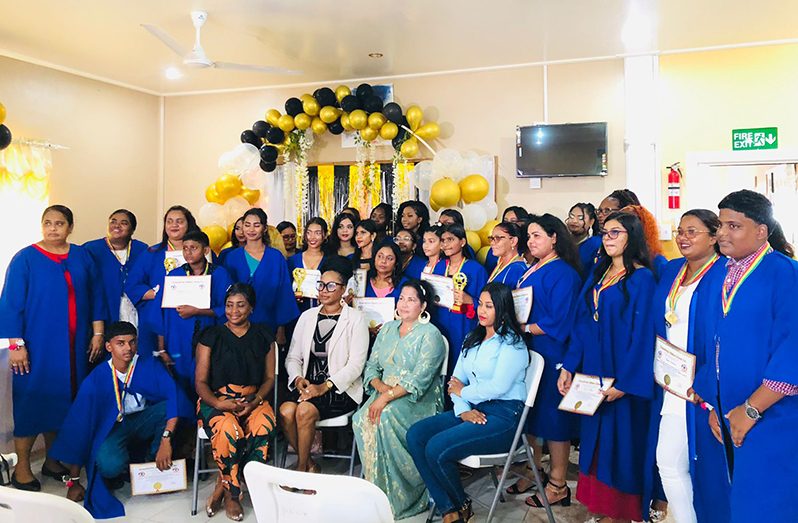 Graduates with faculty members of the Humanitarian Mission Guyana Inc. at the graduation ceremony (Humanitarian Mission Guyana Inc. photo)