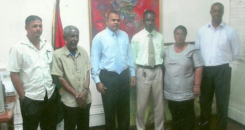 Executive members of the Berbice Cricket Board paid a courtesy call on Minister of Sport Dr. Frank Anthony (3rd from left). Also sharing the moment is Permanent Secretary within the Ministry of Sport Alfred King.