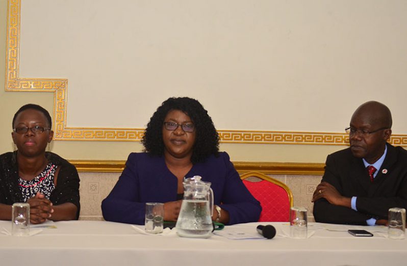 From left to right- Programme Manager of the National AIDS Programme (NAPS), Dr. Rhonda Moore; Minister within the Ministry of Public Health, Dr. Karen Cummings; and UNAIDS Country Director, Dr. Martin Odiit (DPI photo)