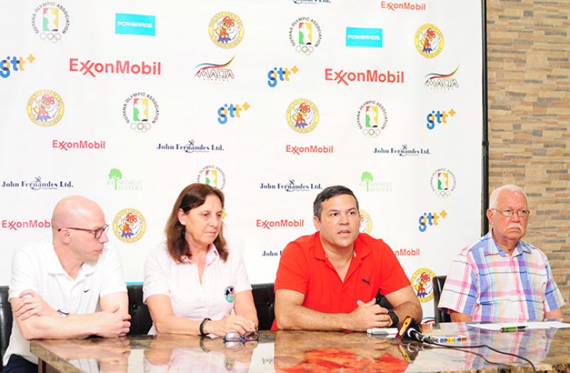 At head table: From left, PAHF Tournament Director, Adrian Dellamattia; PAHF Events Coordinator,Laura Macchiotti; GHB President, Phillip Fernandes and sports journalist/commentator, ,Joseph ‘Reds’ Perreira, who chaired yesterday’s proceedings (Delano Williams photo)