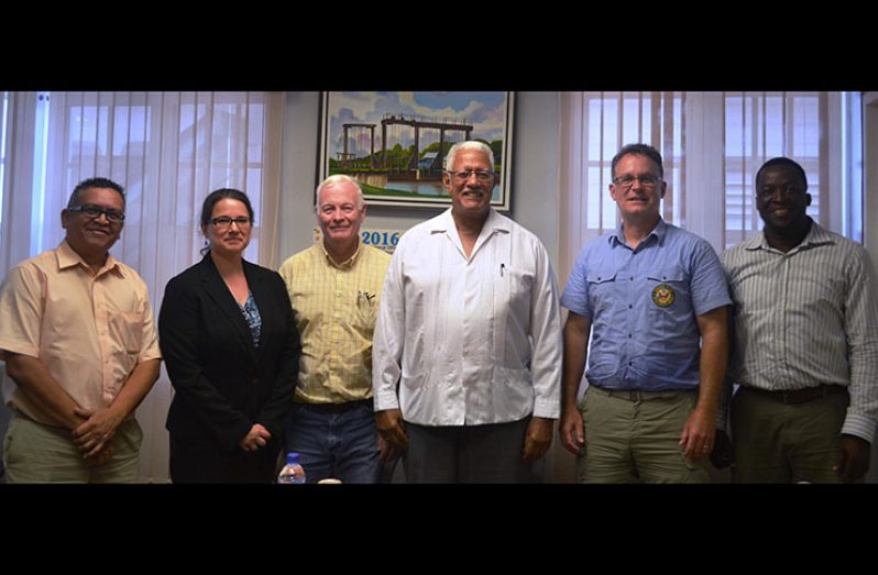 Caption for the Photo: L-R :Chief Fisheries Officer, Mr. Denzil Roberts, Economic and Political Affairs Associate, United States Embassy, Ms. Amy Knaup, Fisheries Gear Specialist, U.S. Department of Commerce, National Oceanic and Atmospheric Administration, Department of Commerce, USA, Mr. Jack Forester, Agriculture Minister, Noel Holder, Environmental Officer, US State Department, Mr. Joseph Fette, Head of Legal and Inspectorate Unit, Fisheries Department, Mr. Gary Baird