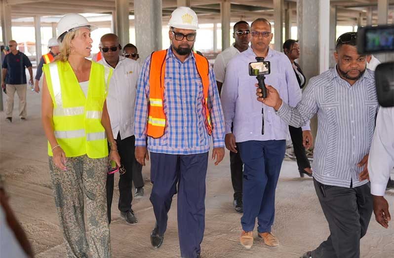 President Dr. Irfaan Ali during a visit to the construction site for the country’s maiden pediatric facility at Goedverwagting, East Coast Demerara