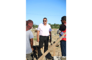 Minister of Housing Collin Croal engages contractors at Le Reconnaissance