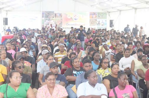 Scores of Guyanese at the recently completed Dream Realised Housing Drive in Region Six