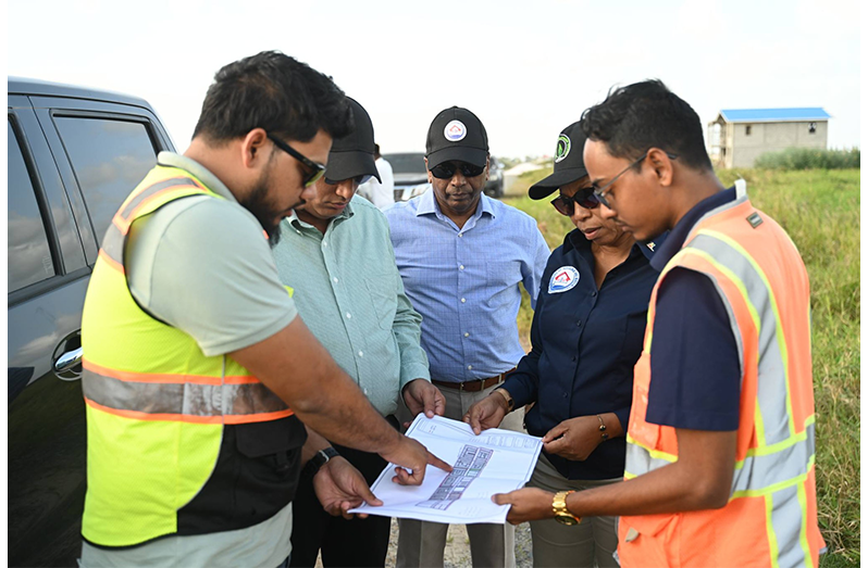 Minister of Housing Collin Croal; Minister within the Ministry, Vanessa Benn; Permanent Secretary Mr. Bishram Kuppen; and technical staff on Friday visited Stewartville East and West to assess works. Several contracts have since been terminated and are to be re-tendered shortly (Ministry of Housing photos)